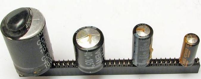 Вздувшиеся электролитические конденсаторы 